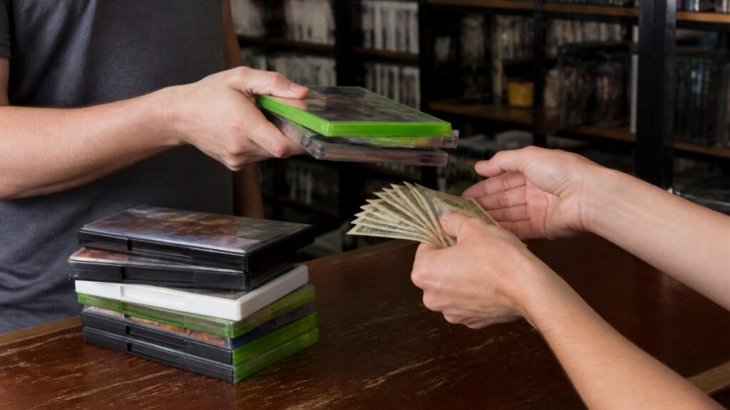 Transaction of video games for cash payment.